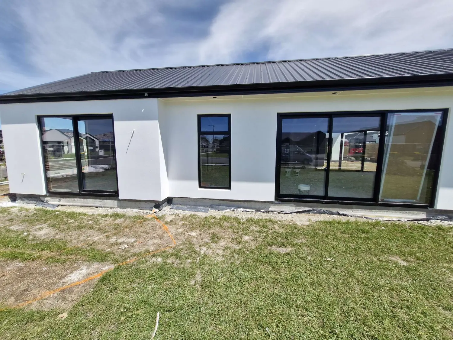 Modern home with fresh white render
